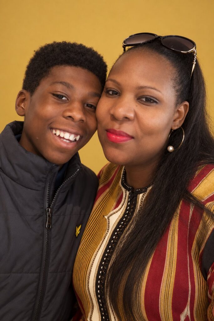 David Shelton with his mother, Shema Mukasi