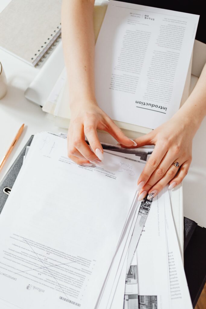 Documents being reviewed at a desk